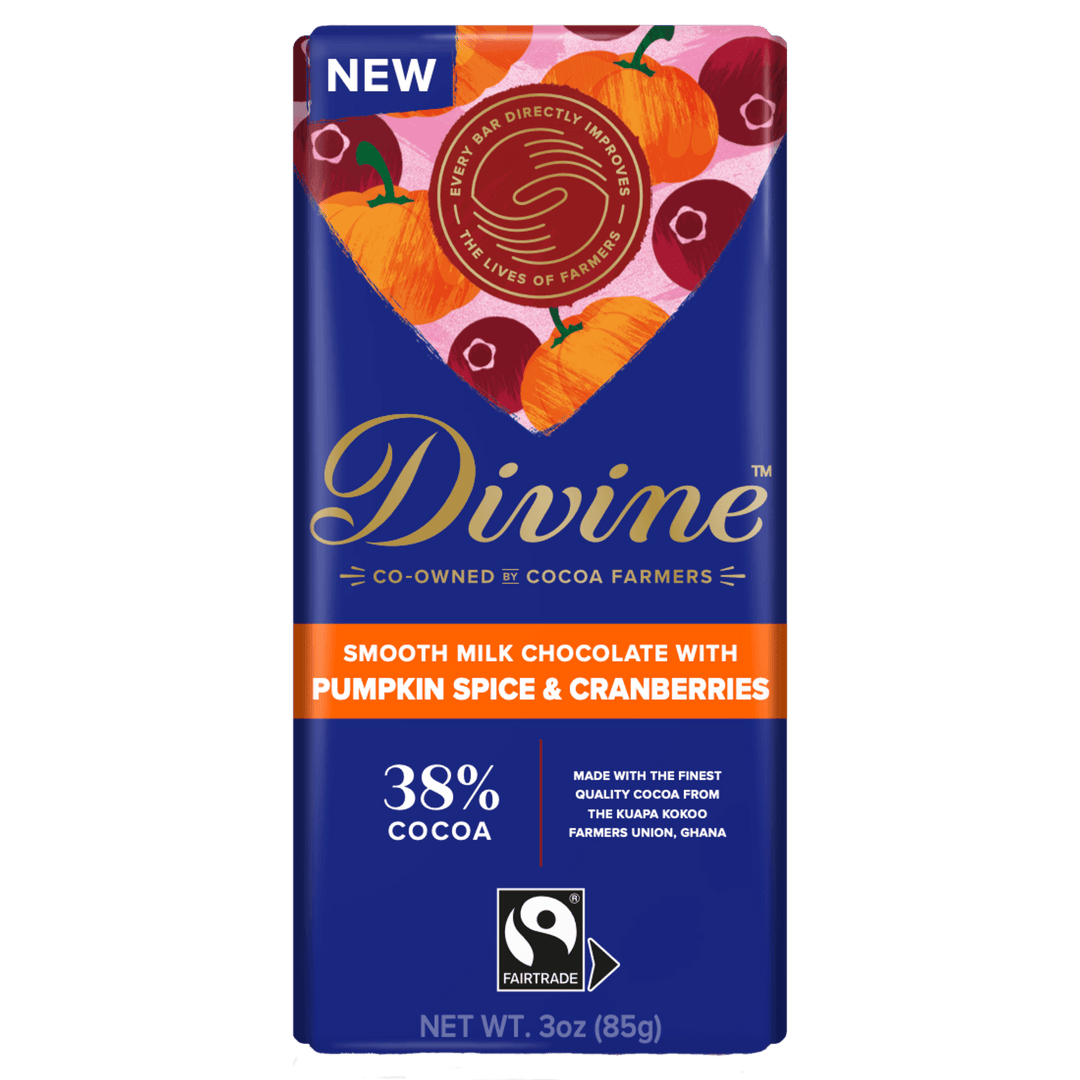 A 3 oz Divine chocolate bar package featuring a deep blue wrapper with gold and white text, an orange flavor band, and a pumpkin-and-cranberry illustration at the top.