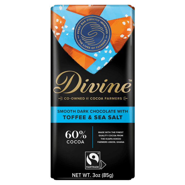 A 3 oz bar of Divine Fair Trade Direct Fairness Chocolate with Toffee & Sea Salt, featuring a black wrapper with gold, blue, and orange accents, and a Fairtrade logo.
