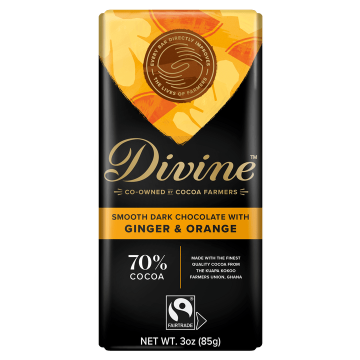 A 3 oz Divine Fairtrade chocolate bar with ginger and orange flavor, featuring a black wrapper with gold and orange accents and a Fairtrade logo.