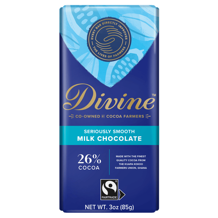 A 3 oz Divine milk chocolate bar, 26% cocoa, in its original packaging. The wrapper is primarily deep blue with a light blue patterned section at the top, gold 'Divine' branding, and a turquoise band reading 'Seriously Smooth Milk Chocolate'.